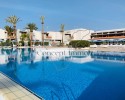 Modernly renovated and furnished apartment with a west terrace, swimming pool, garden and VV license!