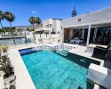 Modern and fully furnished house with private pool, electric carport and sea views!