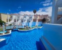 Modern, renovated, and furnished apartment with a heated pool, just 500m from Playa de Fañabe!